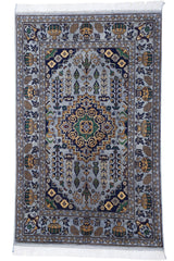 Hand-knotted Afghani Zerkhaki wool rug in silver tones, laid flat showing detailed pattern
