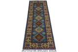 Hand-knotted Afghani Kazak wool rug with geometric patterns in red, blue, and beige, featuring a central medallion design and fringed edges.