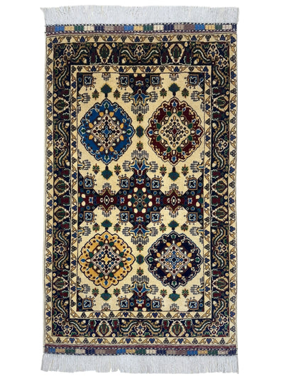 Hand-Knotted Afghani Kashi Wool Rug displaying blue, cream, and red traditional pattern