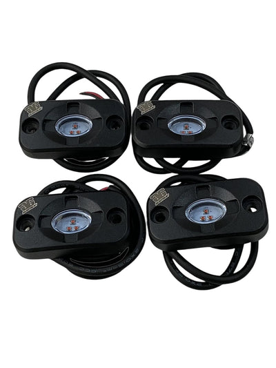 RL15 Rock Light Bundle showing a red LED light with aluminum housing and laser engraved logo.