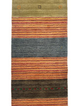 Hand-loomed Indo-Gabbeh runner rug with horizontal bands in olive green, rusty orange stripes, muted blue with small checkered motifs, and dark brown accented with red and green dots.