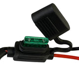 Black wiring harness with red and black cables and an open fuse holder revealing a green 30 amp fuse inside, shown against a white background.