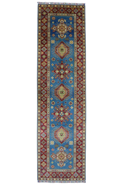 Hand-knotted Afghani Kazak wool runner rug in rich red and blue tones