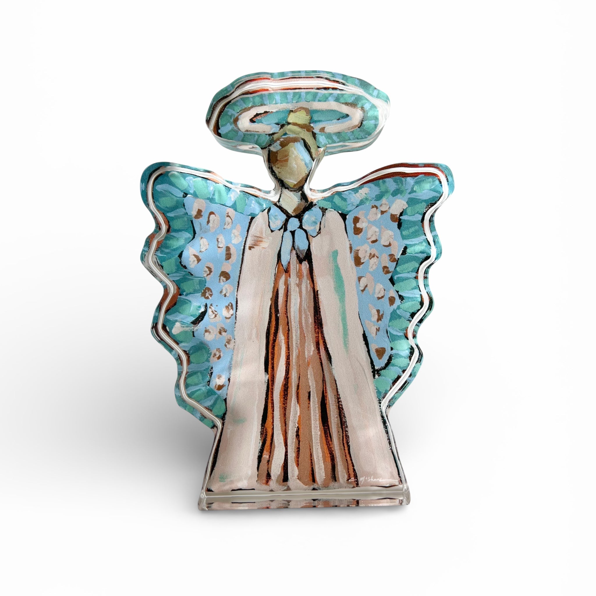 Heavenly Angel II Acrylic Tabletop Art by Chelsea McShane displayed on a wooden shelf among books and candles