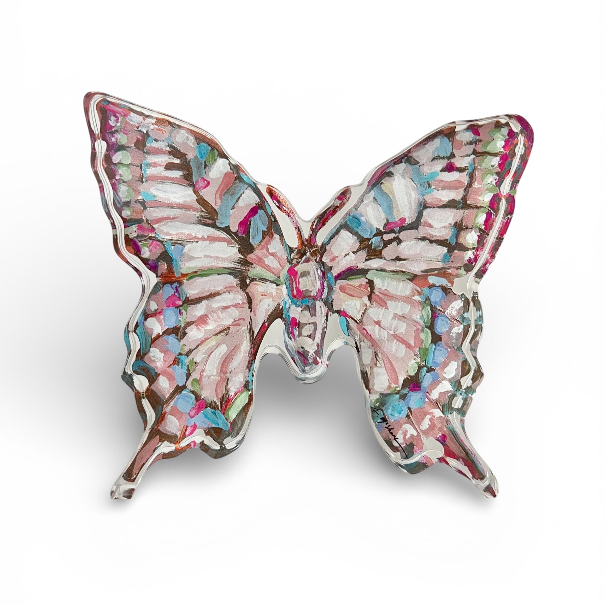 Butterfly I Acrylic Tabletop Art by Chelsea McShane, thick clear acrylic block with vibrant butterfly design, shown on a wood shelf.
