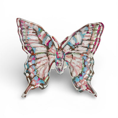Butterfly I Acrylic Tabletop Art by Chelsea McShane, thick clear acrylic block with vibrant butterfly design, shown on a wood shelf.