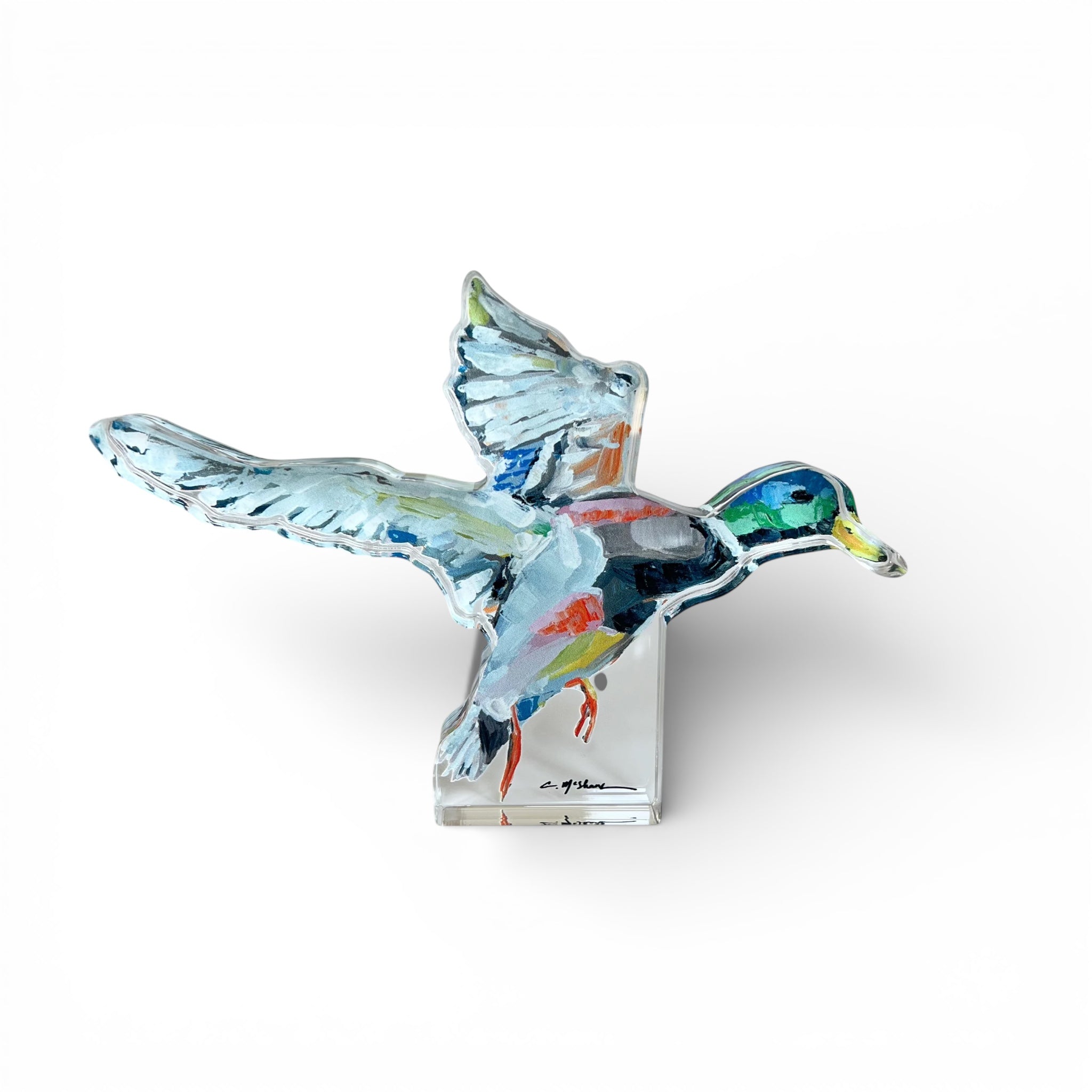 Take Flight Mallard Duck Acrylic Tabletop Art sitting on a wooden surface with a muted background