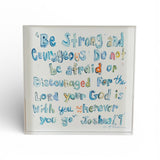Joshua 1:9 Bible Verse Acrylic Tabletop Art in blue color, freestanding on a wooden surface