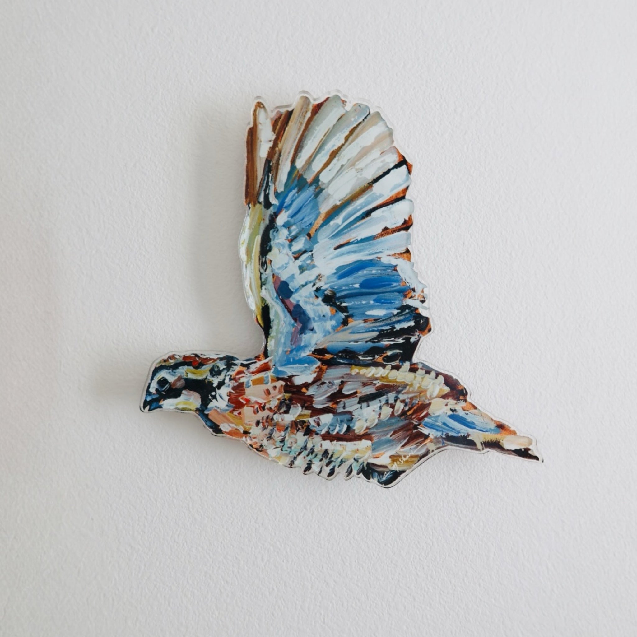 "Quail" Acrylic Wall Contour mounted on white wall, showing abstract shapes and warm colors