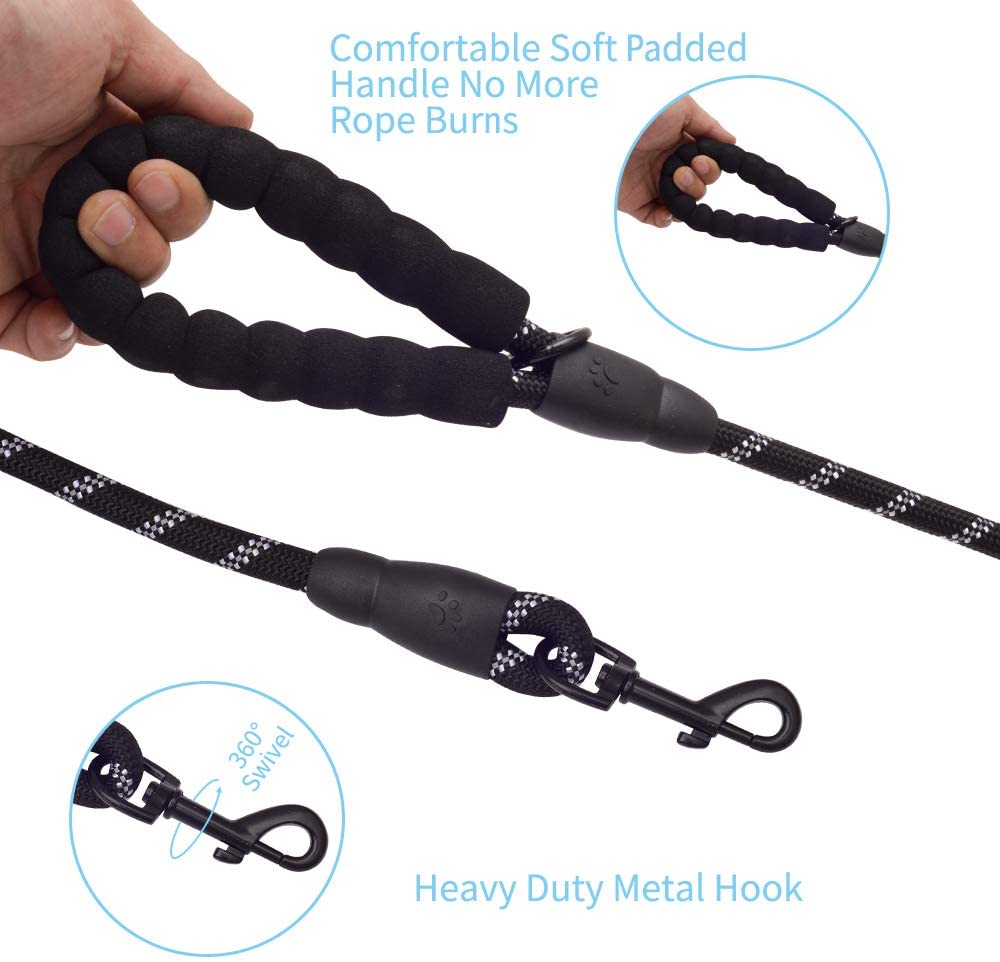 Black and white braided 6-foot dog leash with cushioned soft padded handle and heavy-duty black metal swivel hook attachment, shown held in hand.