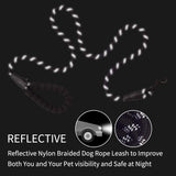 Black nylon dog leash with reflective woven accents and padded handle, designed for enhanced nighttime visibility and comfort during walks.