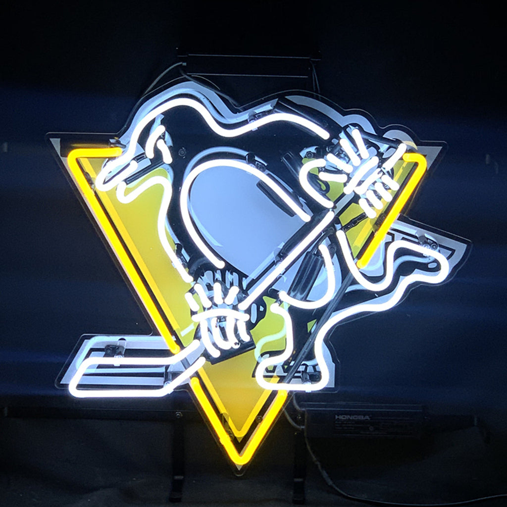 Pittsburgh Penguins Hockey Neon Sign glowing against a dark wall