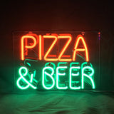 Rectangular neon sign with the words 'PIZZA' in red-orange and '& BEER' in bright green glowing against a dark background.