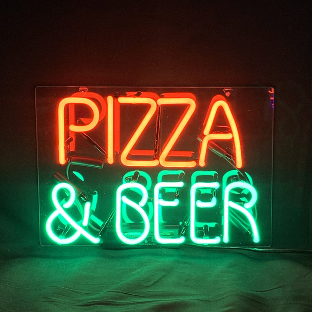 Pizza & Beer Neon Signs Light glowing on a wall with its metal grid backing