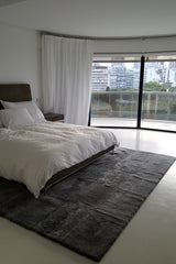 Plain Stacked - Charcoal Lambskin Rug by Homelosophy