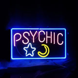 Rectangular neon sign with the word 'PSYCHIC' in pink, a white star and a yellow crescent moon, all outlined by a bright blue border against a dark background.