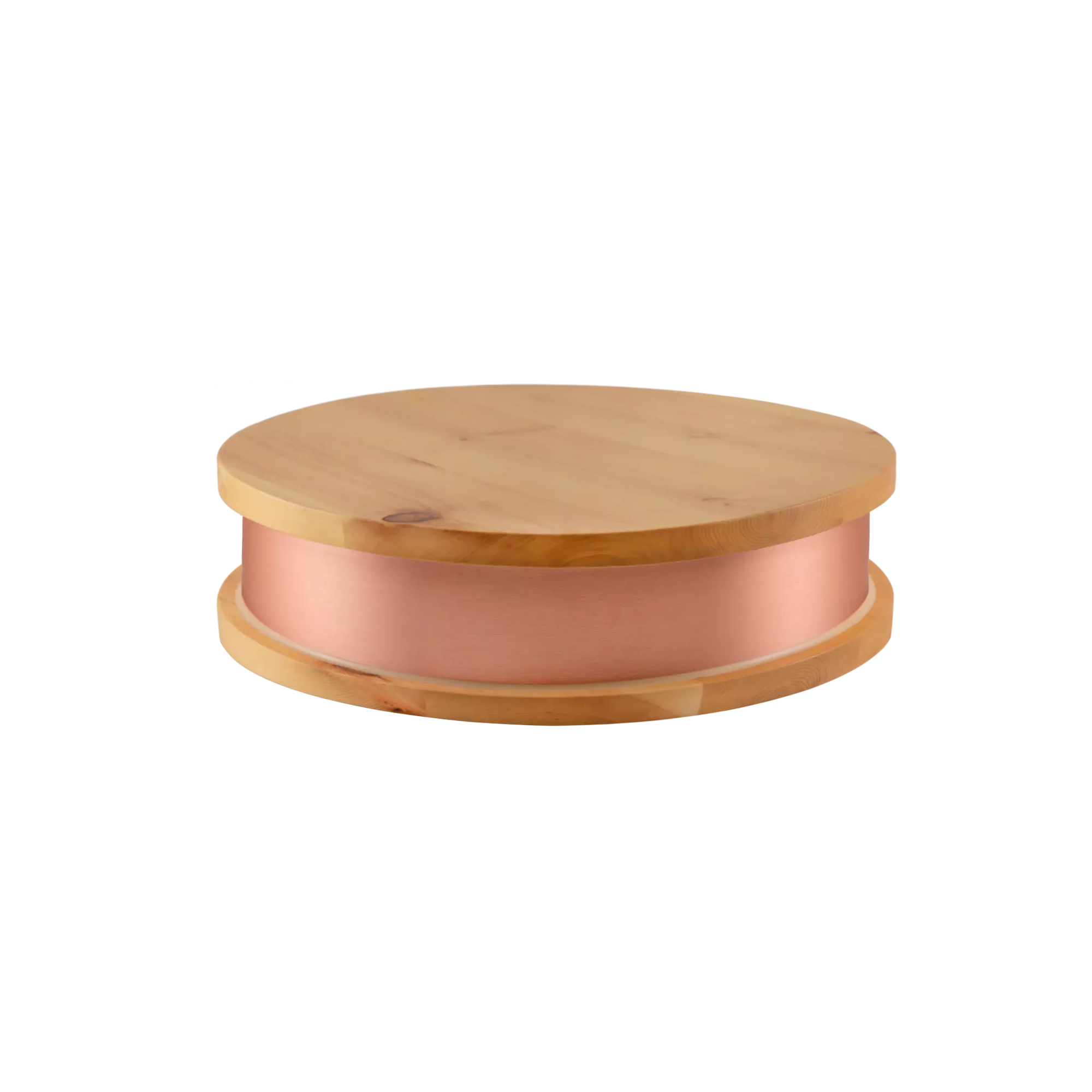 Qi-Max device on a wooden surface in a modern interior setting