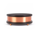 Qi-Home Cell placed on a wooden surface blending with modern home decor