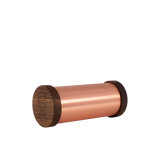 Cylindrical copper tube with rounded wooden end caps, one end engraved with a logo and text, shown on a white background.
