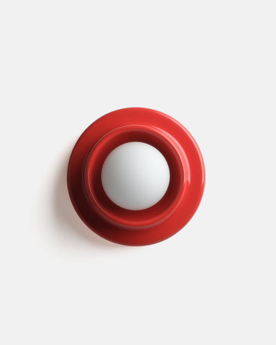 Red Q Sconce wall lamp with ceramic body and glass globe