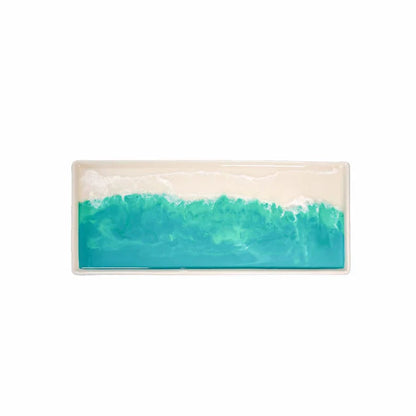 Rectangular resin ceramic tray with turquoise and beige gradient design on a white background