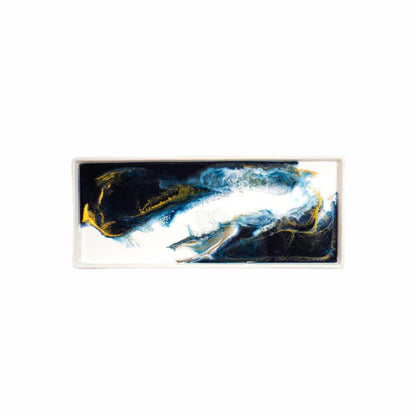 Abstract resin ceramic tray piece with blue, white, and gold colors on a white background