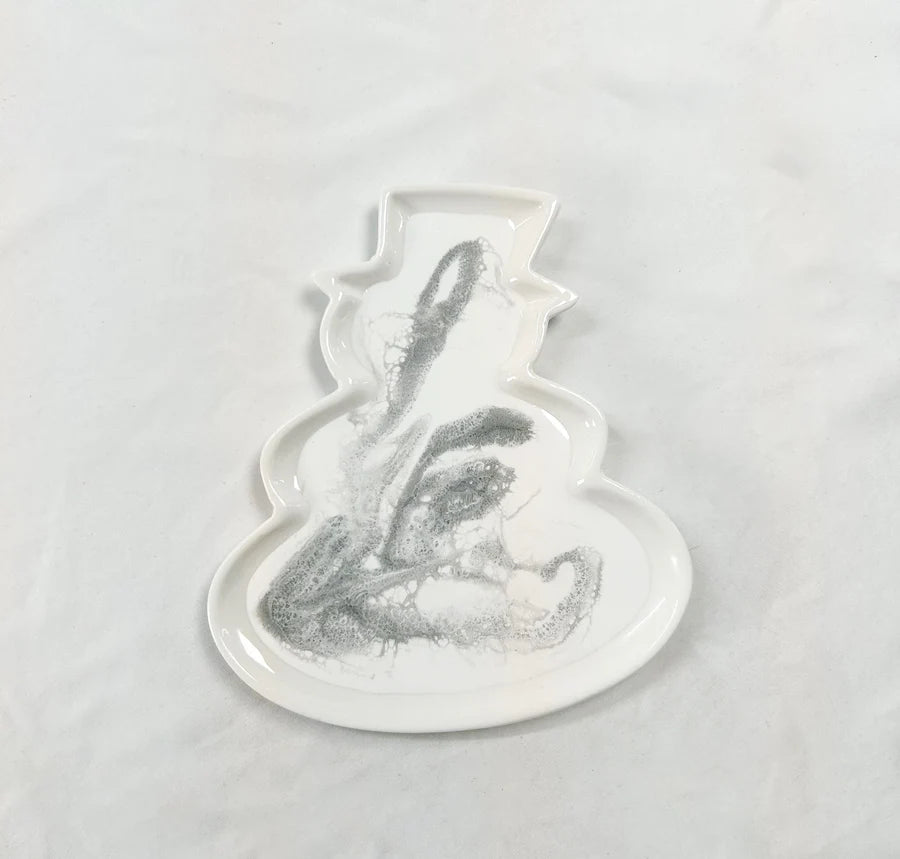 White Resin Ceramic Snowman Tray on a light gray background