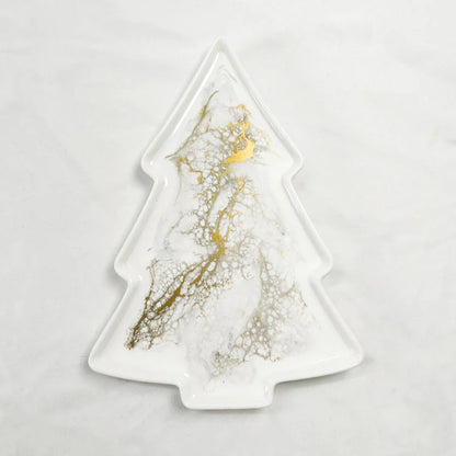 Christmas tree-shaped Resin Ceramic Tray with gold and silver leaf design on a light gray background