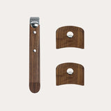 Set of three wood handles with smooth polished finish; one long rectangular handle with metal cap and two shorter curved handles with central holes.