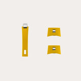 Set of three yellow resin handles with silver rectangular metal attachments, one long curved handle and two shorter rectangular handles shown on a white background.