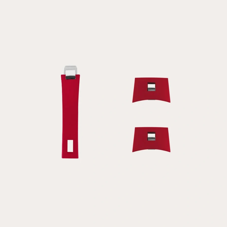 Three red resin handles with modern squared metal accents, including one long vertical handle and two smaller curved square handles, on a plain light background.