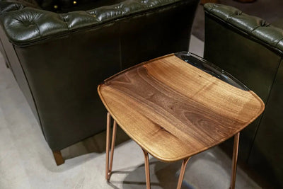 Rectangular resin side table with walnut wood and ivory resin top, shown with various leg color options