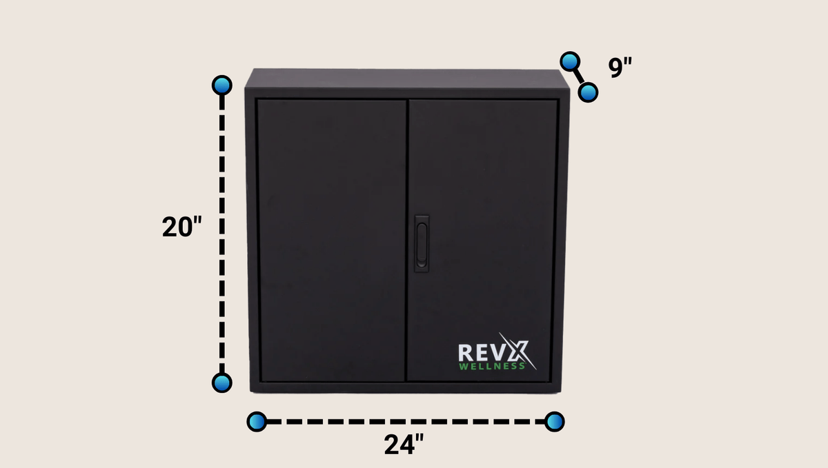 Compact black rectangular water filtration system with two doors, a central handle, and the 'RevX Wellness' logo on the bottom right, measuring 24" wide, 20" high, and 9" deep.