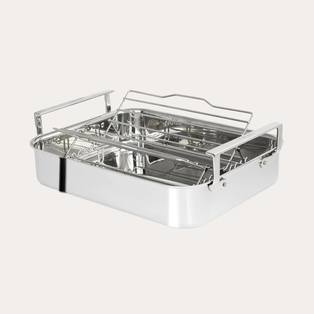 Rectangular stainless steel roasting pan with two sturdy handles and an elevated rack inside for even cooking.