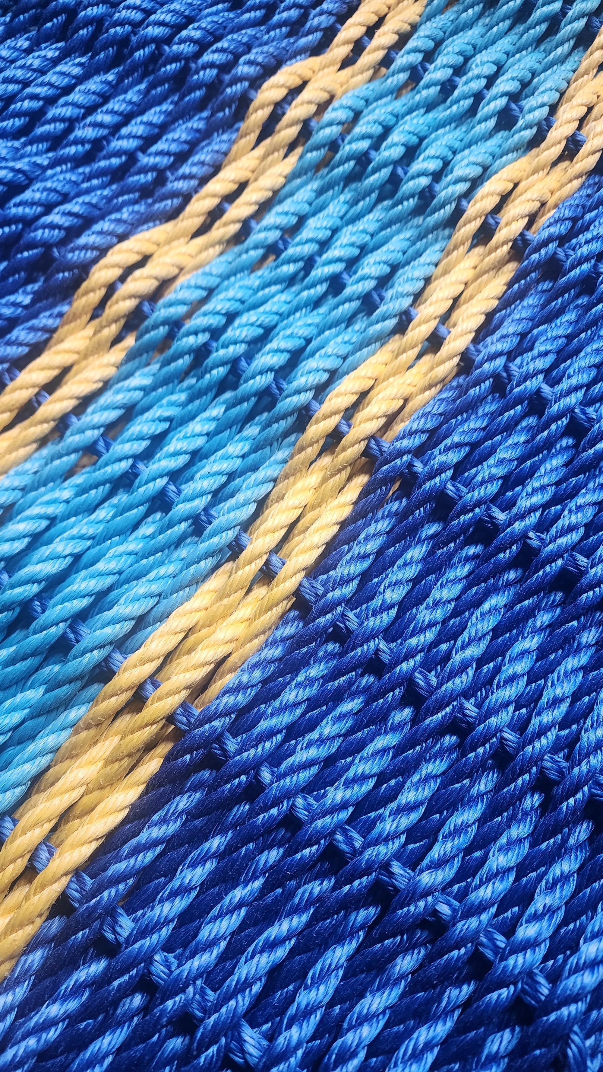 Two tone blue and yellow accent rope mat made with lobster rope by Little Salty Rope
