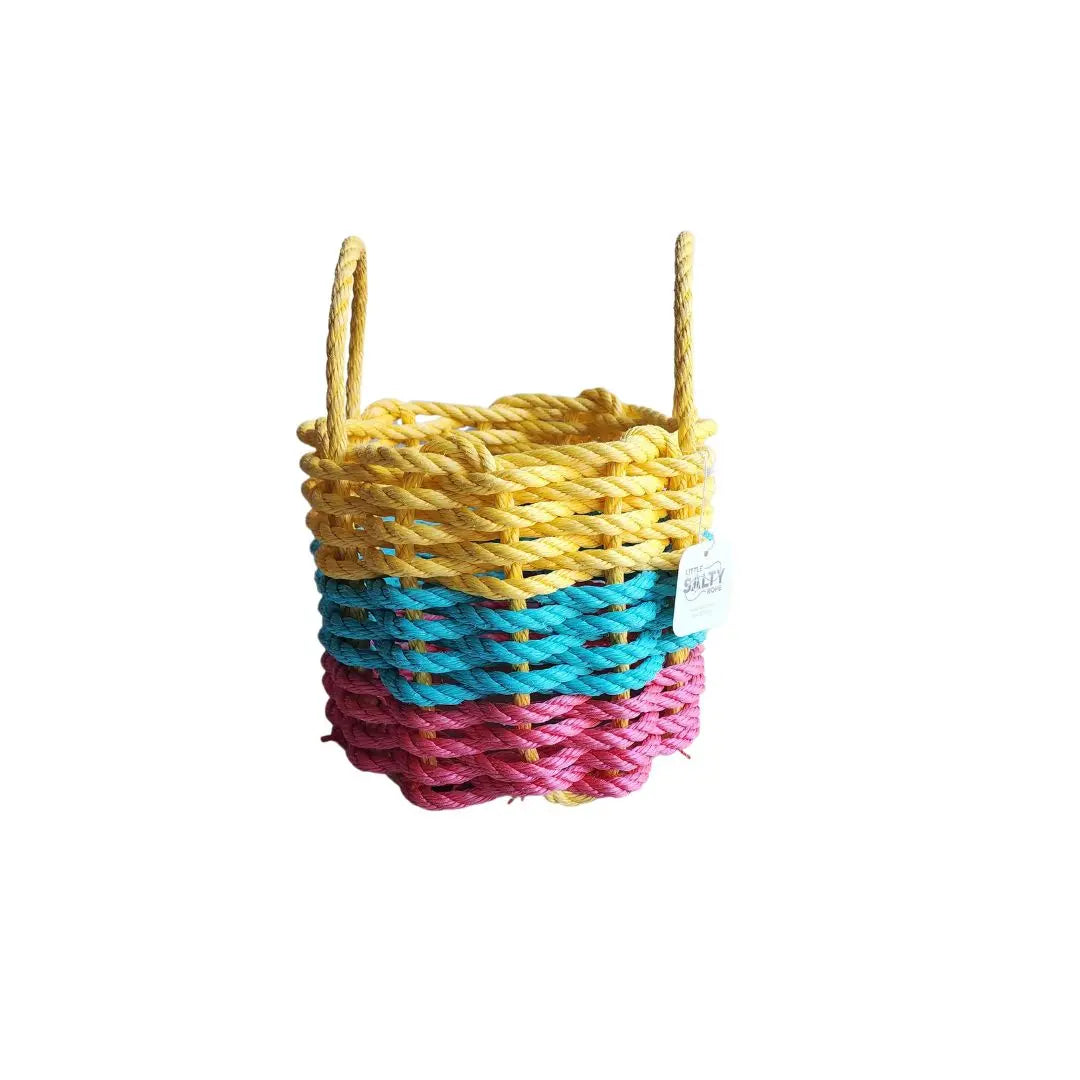 Colorful handmade rope storage baskets in pink, teal, and yellow, available in three sizes