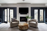 Round Cowhide Ottoman by Homelosophy