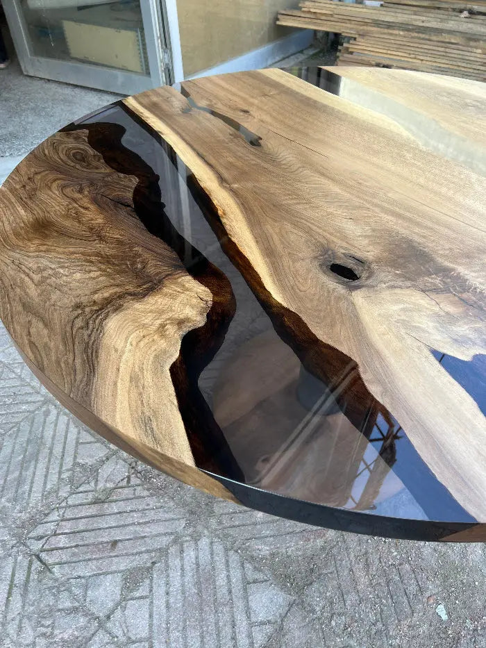 Custom round epoxy resin walnut dining table with wood and metal base