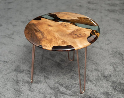 Round walnut wood side table with clear epoxy resin top and rounded edges from Osso Collection
