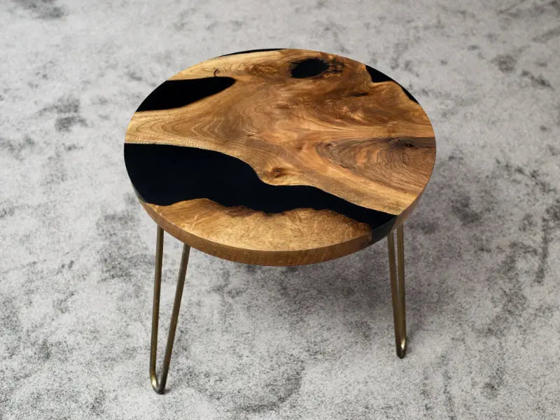 Round walnut wood side table with clear epoxy resin and straight edges