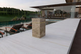 Luxury Travertine Marble Side Table with warm LED light band in outdoor patio setting