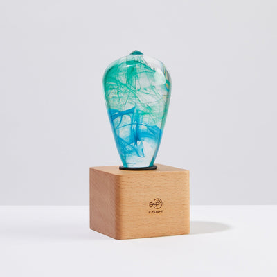 EP Light 4-Pack Resin LED Bulbs with Wooden Base showing unique handcrafted resin bulbs in various colors