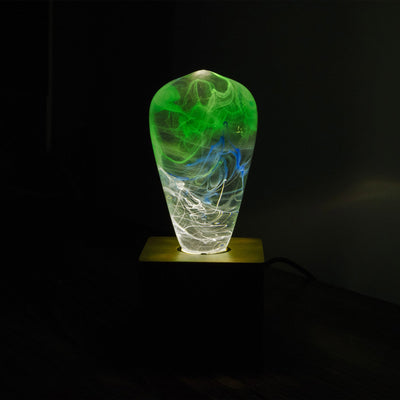 EP Light 4-Pack Resin LED Bulbs with Wooden Base showing unique handcrafted resin bulbs in various colors