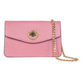 Soft pink leather clutch with an envelope flap, featuring a central custom octagonal Swarovski stone set in gold-tone hardware and a gold chain strap.