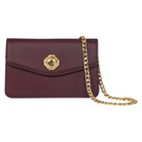 Bordeaux-colored leather clutch with an envelope flap and a central gold-toned hexagonal Swarovski stone embellishment, featuring a gold chain strap.