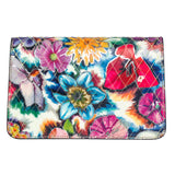 Rectangular leather clutch with vibrant multicolored floral patterns in shades of blue, pink, red, orange, and green and diagonal quilting stitching.