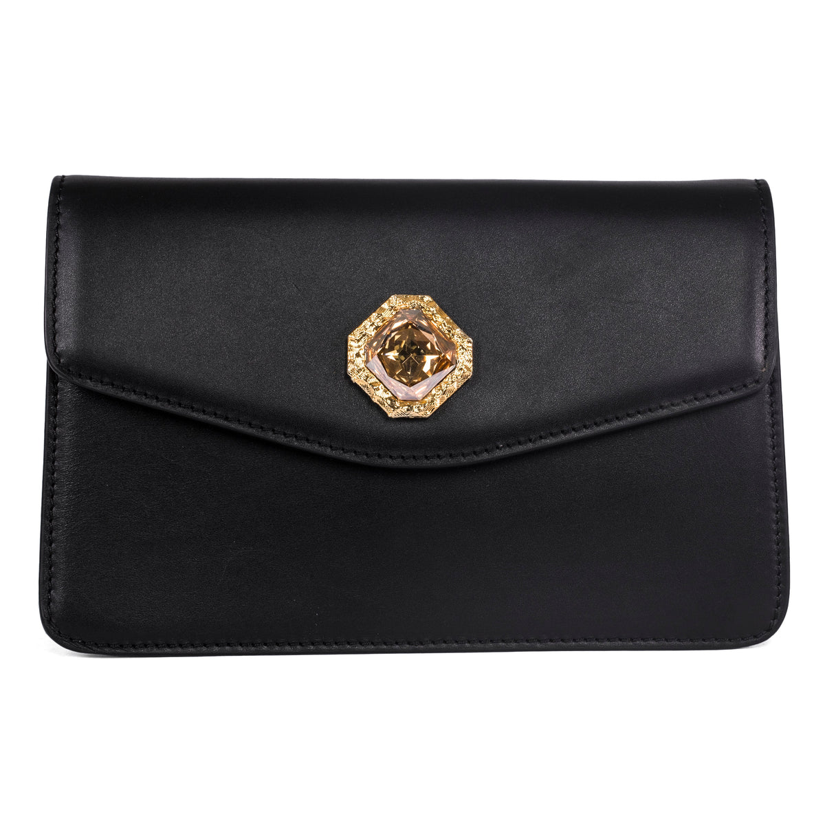 Black leather clutch with a flap closure featuring an octagonal custom gold-tone Swarovski stone emblem centered on the front.