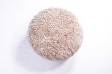 Sand Curly Goatskin Round Ottoman by Homelosophy
