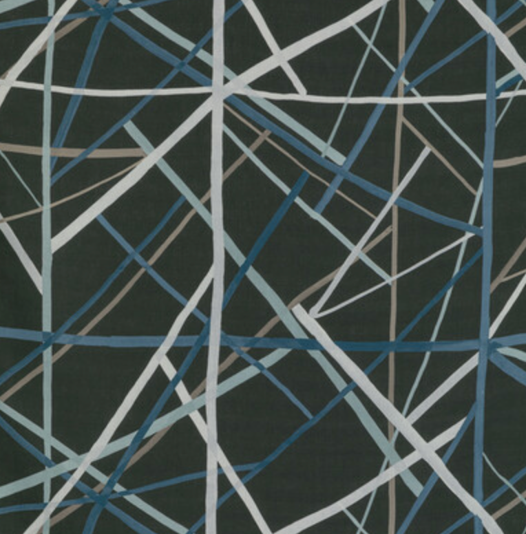 Dark fabric with an abstract geometric pattern of intersecting thin lines in blue, gray, and beige hues resembling crisscrossing shadows.