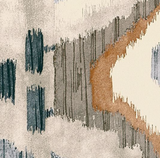 Close-up of a pillow fabric featuring an abstract pattern with gray, beige, burnt orange, and dark blue vertical brushstroke shapes on a textured light background.